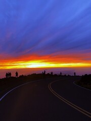 sunset over the road