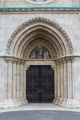 Fototapeta na wymiar View of the entrance portal to the Church of St. Matthias in Budapest. Hungary
