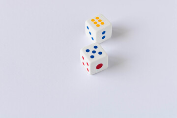 Dice on the light background. Close up. The concept of good luck in gambling.