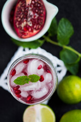 Pomegranate cocktail. Summer light alcoholic drink.