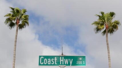 Pacific Coast Highway, historic route 101 road sign, tourist destination in California USA. Lettering on intersection signpost. Symbol of summertime travel along the ocean. All-American scenic hwy