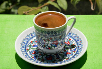 a cup of Turkish coffee on the table
