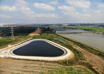 artificial pond of a triangular oval shape