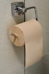 toilet paper roll on white wall