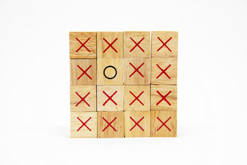 One O wooden block in the four layer group of X wooden block on white background for idea concept...