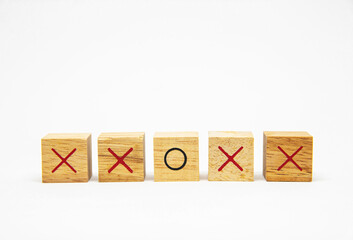 Single row of wooden square block with O and X character symbol isolated on white background for...