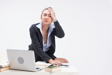 Business woman sit in office. Using a computer laptop and mobile phone work and contact,study business ideas, talk to a friend, shopping online.
