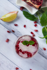 Pomegranate cocktail. Summer light alcoholic drink.