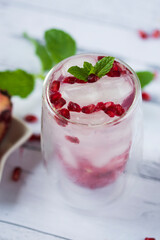 Pomegranate cocktail. Summer light alcoholic drink.