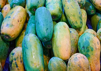 Pile of papayas for sales in a market