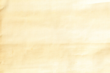 Old pale yellow crumpled paper background texture