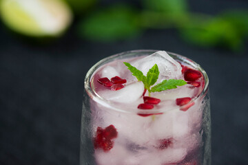 Pomegranate cocktail. Summer light alcoholic drink.