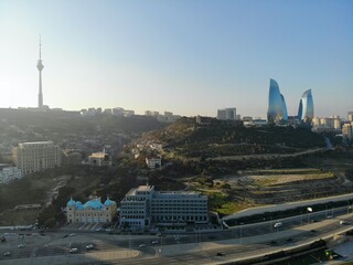 Amazing aerial view from above by drone on capital of Azerbaijan - Baku. Tele tower and Flame towers