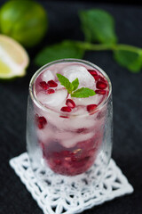 Pomegranate cocktail. Summer light alcoholic drink.