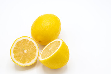 Yellow lemon fruit with a white background,.Isolate and copy space for text and design,Lemon is a citrus fruit with high vitamin C, Lime can be cooking for food and dessert.