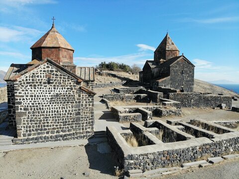 Sevan Lake and Sevanavank oldest church. Mountains country Armenia. Aerial view from above by drone.
