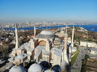 Naklejka premium Istanbul, culture and historical capital of Turkey. Aerial photo from above. City view and landscape photo by drone. Aya Sofia central mosque