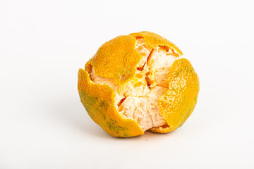 

peeled tangerine yellow color on white background