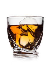 Scotch whiskey in crystal modern luxury glass with ice cubes on white background.
