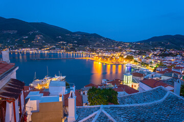 View of town and port at the island Skopelos, northern Sporades, Greece