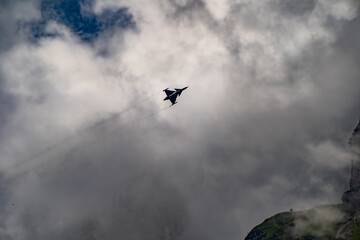 Fototapeta na wymiar Dassault Rafale in Schweizer Bergen Swiss Mountains 