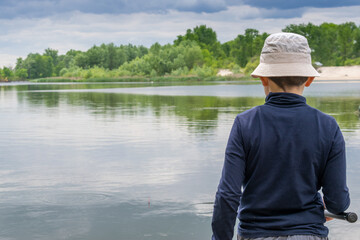 Boy catching fish