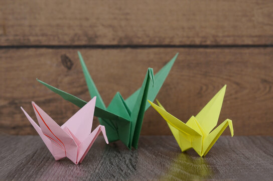three color origami paper cranes