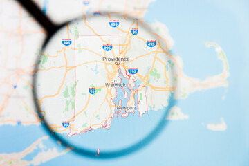 Los Angeles, California, USA - 15 March 2019: Rhode Island, RI state of America visualization illustrative concept on display screen through magnifying glass