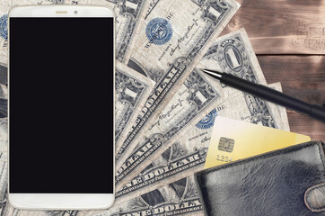 1 US dollar bills and smartphone with purse and credit card. E-payments or e-commerce concept....