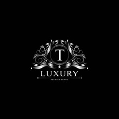 T Luxury Logo. Template flourishes calligraphic elegant ornament lines. Business sign, identity for Restaurant, Royalty, Boutique, Cafe, Hotel, Heraldic, Jewelry, Fashion and other vector illustration