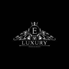 E Luxury Logo. Template flourishes calligraphic elegant ornament lines. Business sign, identity for Restaurant, Royalty, Boutique, Cafe, Hotel, Heraldic, Jewelry, Fashion and other vector illustration