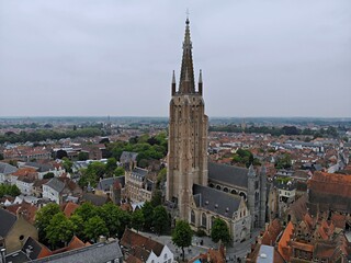 Fototapeta na wymiar Amazing view from above. So impressive and beautiful Brugge. Medieval history around you.Must see for all explorer. View from Drone. From Belgium with Love.