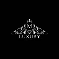 M Luxury Logo. Template flourishes calligraphic elegant ornament lines. Business sign, identity for Restaurant, Royalty, Boutique, Cafe, Hotel, Heraldic, Jewelry, Fashion and other vector illustration