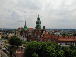 Fototapeta na wymiar Aerial photo from drone. The culture and historical capital of Poland. Comfortable and beautiful Krakow. The land of Legend. The Wawel Castle.