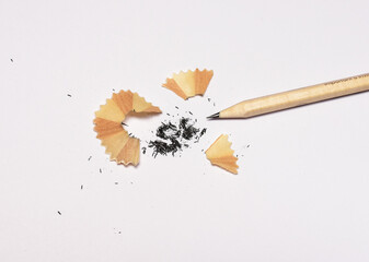 pencil and pencil shavings isolated on white background 