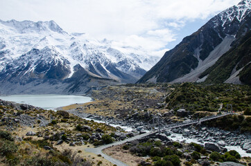 Fototapeta na wymiar Hooker river and Mueller lake with snow covered mountains on Hooker Valley Track, South Island, New Zealand