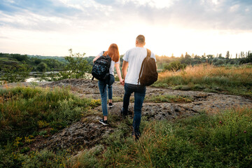 Home Country Traveling, domestic travel. Local travel, Solo Explorers, Small Group tourist. Young couple going for hiking, walk in nature.