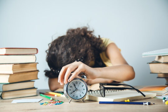 learning girl hand on clock - Powered by Adobe