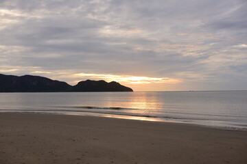 The sunrise view against the golden yellow sky