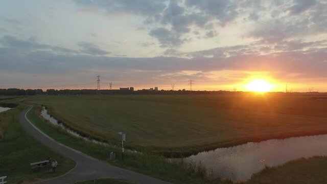 Droneshots of sheeps in the fields of Holland