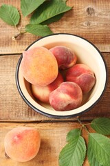 Fototapeta na wymiar Juicy peaches on a wooden table macro 