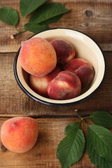 Fototapeta na wymiar Juicy peaches on a wooden table macro 