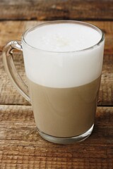 Coffee cappuccino with milk on the table 