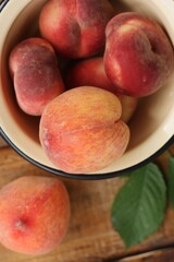 Juicy peaches on a wooden table macro 