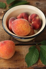 Juicy peaches on a wooden table macro 