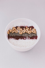 Delicious and healthy breakfast with chia, cereal, coconut flakes.