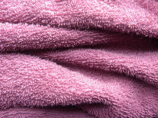 Pink cotton towel with wrinkles