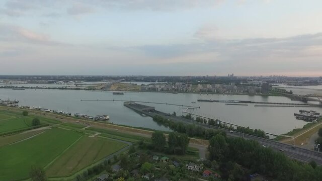 Droneshots of sheeps in the fields of Holland