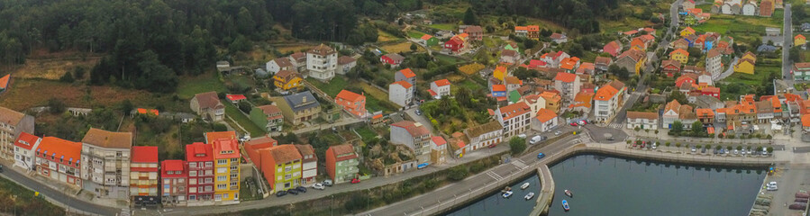 Aerial view in Camarinas. Galicia. Coastal town with boats in Spain