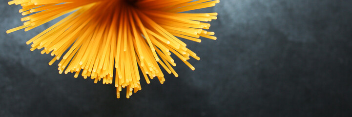 spaghetti pasta raw italian Menu serving size. food background top view copy space organic eating 